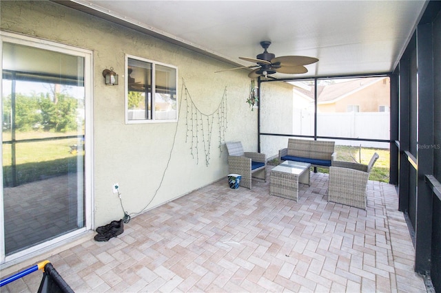 7585 Kavanda St, North Port, FL 34287 - unfurnished sunroom with a ceiling fan and an outdoor hangout area