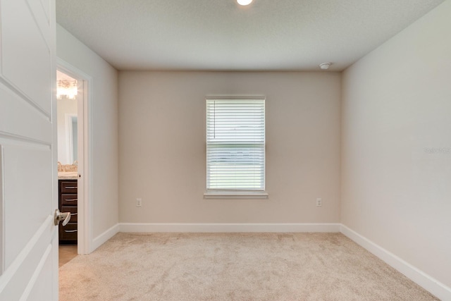 208 Lagoon Mist Ct, Oak Hill, FL 32759 - unfurnished room featuring light carpet and baseboards