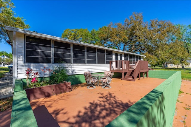191 Howes St, Oak Hill, FL 32759 - exterior space featuring a sunroom