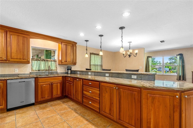 191 Howes St, Oak Hill, FL 32759 - kitchen featuring a sink, brown cabinetry, decorative light fixtures, and dishwasher