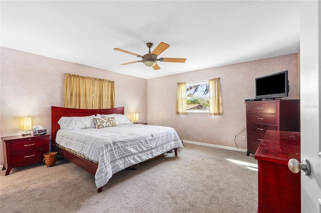 191 Howes St, Oak Hill, FL 32759 - bedroom with ceiling fan, light colored carpet, and baseboards