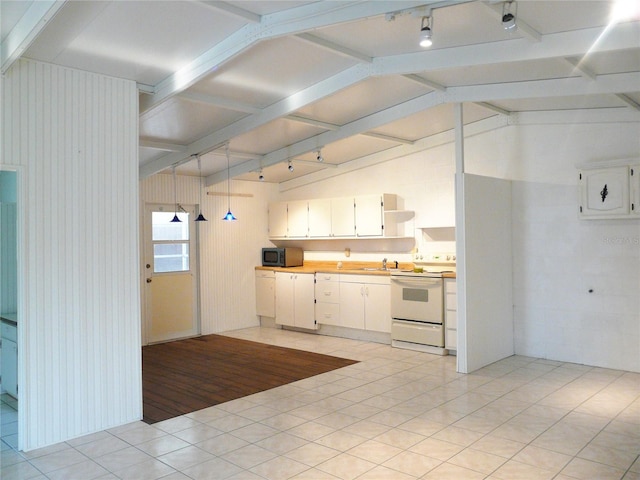 191 Howes St, Oak Hill, FL 32759 - kitchen featuring white cabinets, black microwave, open shelves, and electric stove