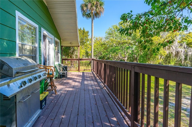 191 Howes St, Oak Hill, FL 32759 - wooden deck featuring grilling area