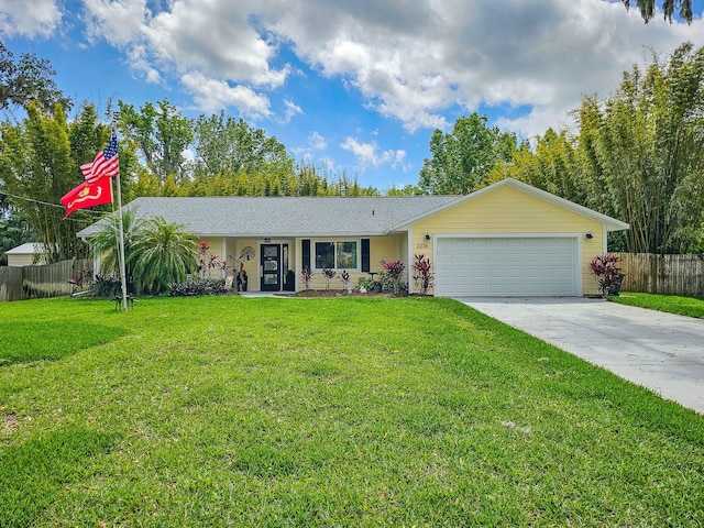 ranch-style home with concrete driveway, a front yard, fence, and an attached garage