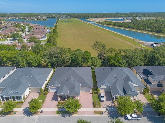 3331 Torre Blvd, New Smyrna Beach, FL 32168 - drone / aerial view featuring a residential view and a water view