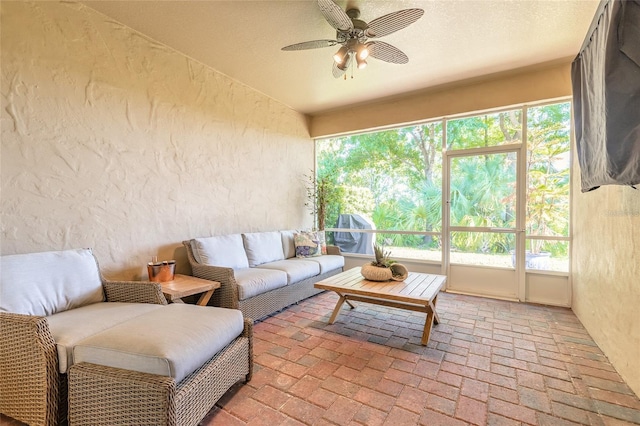 3331 Torre Blvd, New Smyrna Beach, FL 32168 - sunroom featuring a healthy amount of sunlight, outdoor lounge area, and a ceiling fan