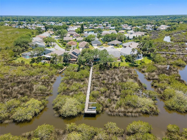 aerial view featuring a water view and a residential view