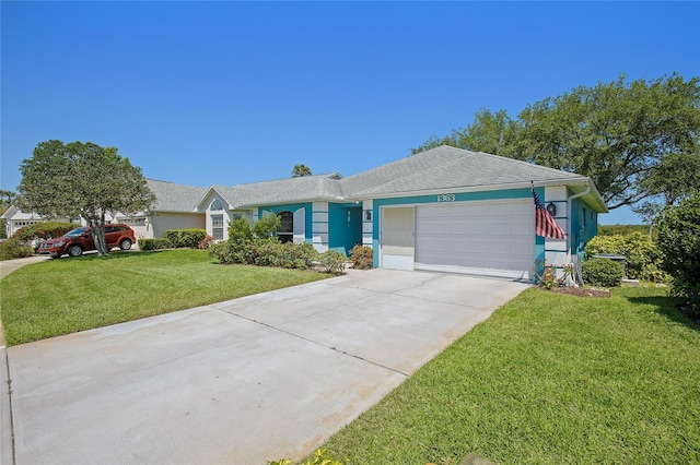 single story home with a garage, stucco siding, driveway, and a front lawn