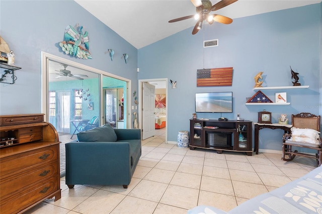 living area featuring visible vents, a ceiling fan, high vaulted ceiling, and light tile patterned floors