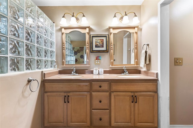 bathroom featuring double vanity and a sink