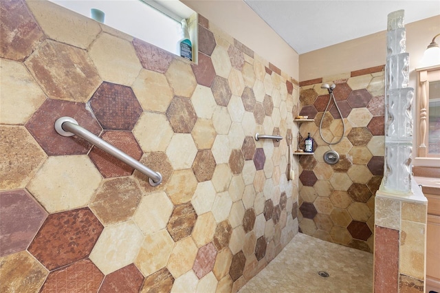 interior details with a tile shower