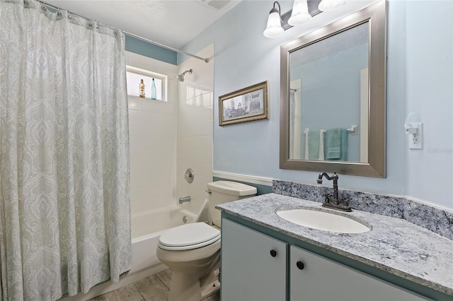 bathroom featuring wood finished floors, toilet, vanity, and shower / bathtub combination with curtain