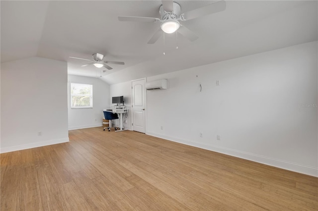 unfurnished living room featuring baseboards, a ceiling fan, a wall mounted AC, light wood-style floors, and lofted ceiling