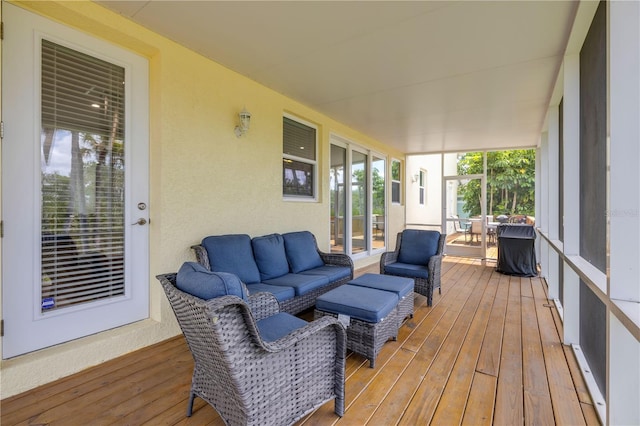 sunroom / solarium with an outdoor living space