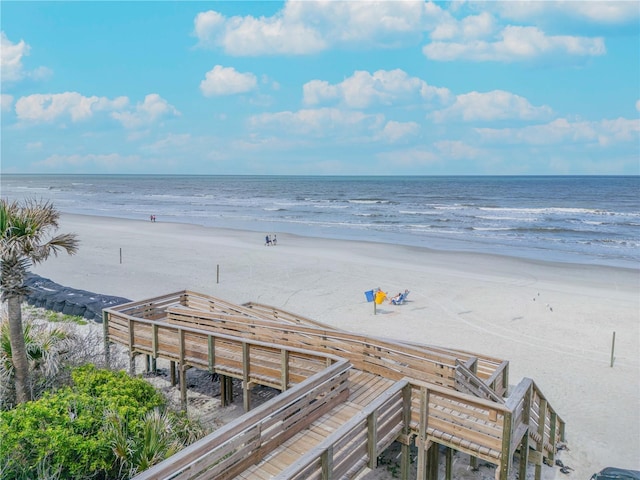 property view of water featuring a beach view