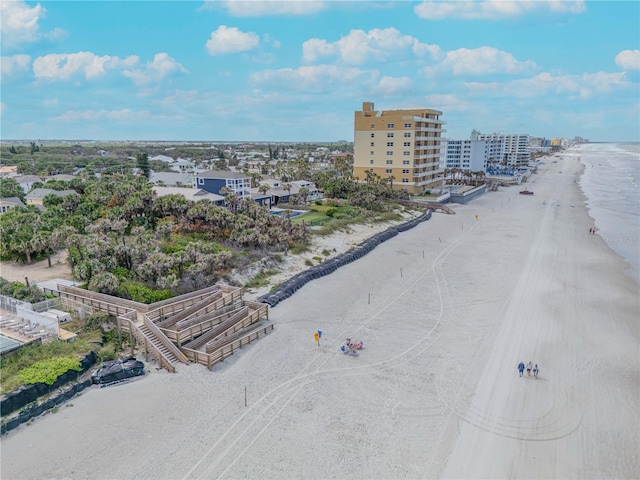 bird's eye view featuring a view of the beach