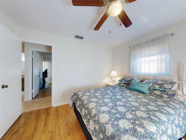 2218 Orange Tree Dr, Edgewater, FL 32141 - bedroom featuring light wood-style flooring, visible vents, and ceiling fan