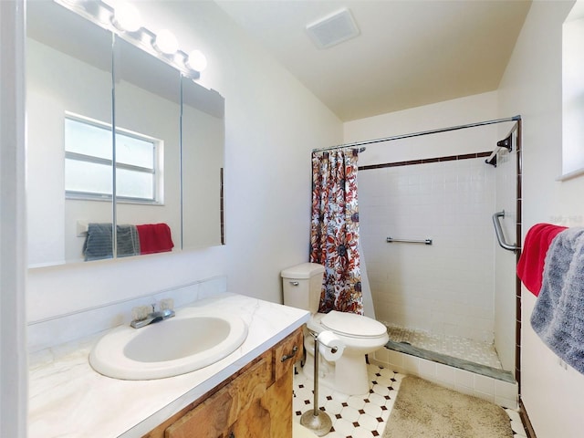 2218 Orange Tree Dr, Edgewater, FL 32141 - bathroom featuring visible vents, toilet, a stall shower, and vanity