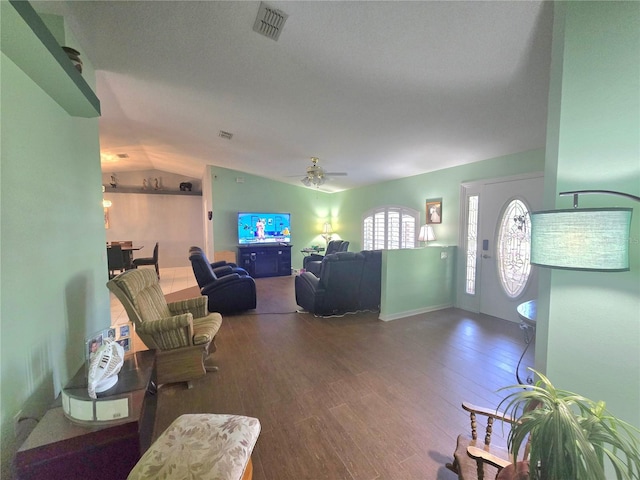 2530 Tamarind Dr, Edgewater, FL 32141 - living room featuring lofted ceiling, wood finished floors, and a ceiling fan