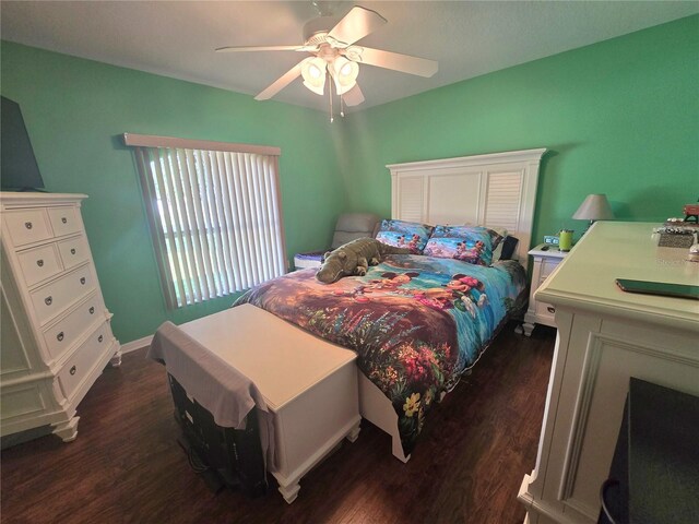 2530 Tamarind Dr, Edgewater, FL 32141 - bedroom with dark wood-style flooring and a ceiling fan