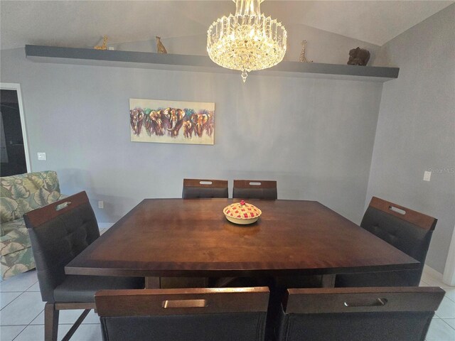 2530 Tamarind Dr, Edgewater, FL 32141 - tiled dining space with a chandelier and lofted ceiling