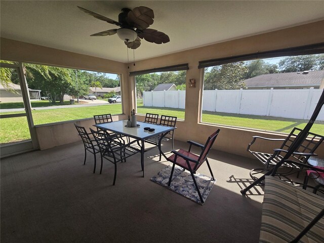 2530 Tamarind Dr, Edgewater, FL 32141 - sunroom / solarium with a ceiling fan and outdoor dining space