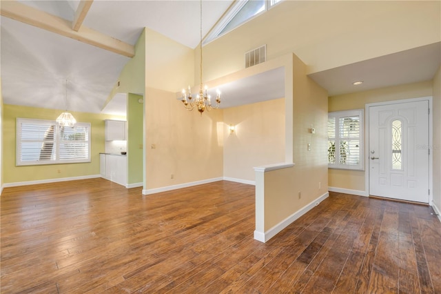 606 Saint Andrews Blvd, New Smyrna Beach, FL 32168 - entryway featuring hardwood / wood-style flooring, visible vents, and an inviting chandelier