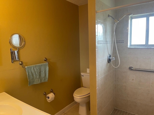 3048 Unity Tree Dr, Edgewater, FL 32141 - full bathroom with a sink, toilet, tiled shower, and tile patterned floors