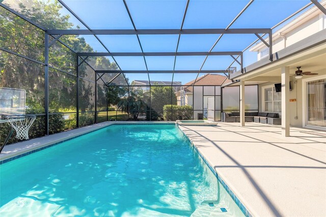 495 Venetian Villa Dr, New Smyrna Beach, FL 32168 - outdoor pool featuring a patio, a lanai, a ceiling fan, and outdoor lounge area