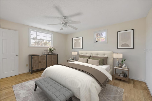 915 E 2nd Ave, New Smyrna Beach, FL 32169 - bedroom with baseboards, a ceiling fan, and wood finished floors