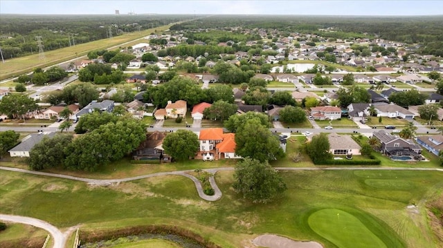 drone / aerial view with a residential view and view of golf course