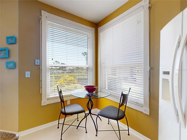 dining space with baseboards
