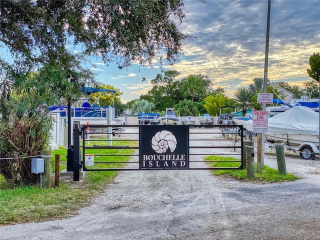 view of gate at dusk