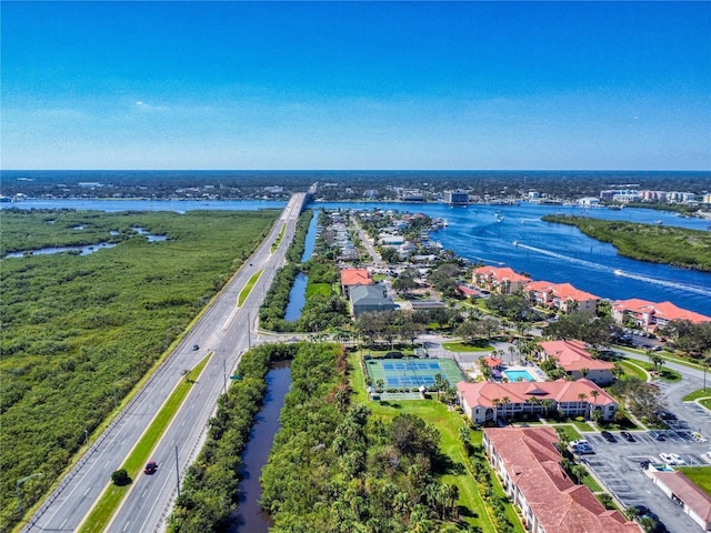 drone / aerial view featuring a water view