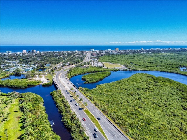 bird's eye view with a water view