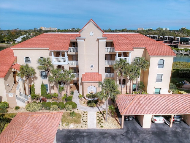 view of property with covered parking