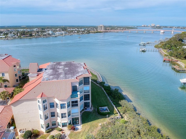 drone / aerial view with a water view