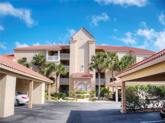 view of property with covered parking