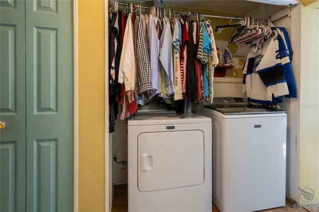 laundry room with washing machine and dryer and laundry area