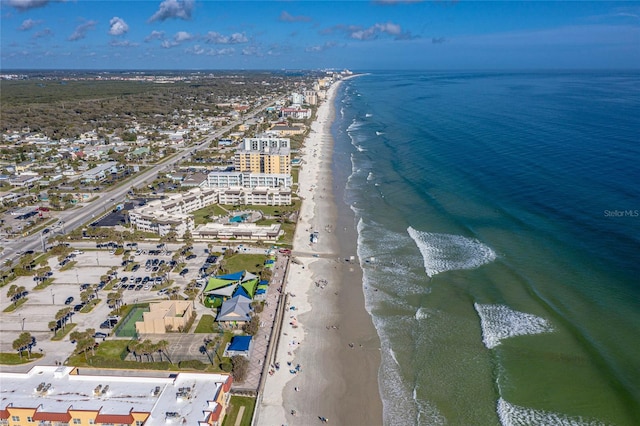 aerial view featuring a view of the beach and a water view