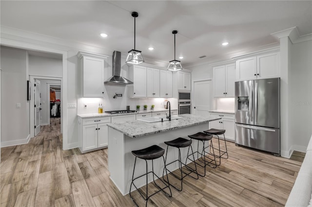 170 Live Oak Ct, New Smyrna Beach, FL 32168 - kitchen featuring crown molding, wall chimney exhaust hood, tasteful backsplash, a sink, and stainless steel appliances