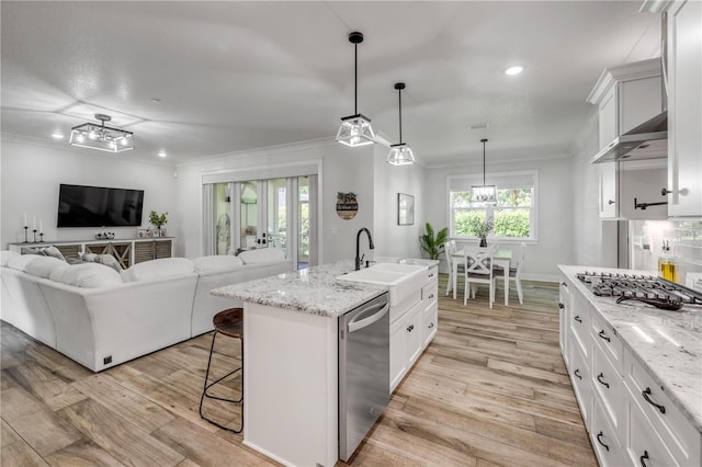170 Live Oak Ct, New Smyrna Beach, FL 32168 - kitchen with a sink, ornamental molding, appliances with stainless steel finishes, and light wood-style floors