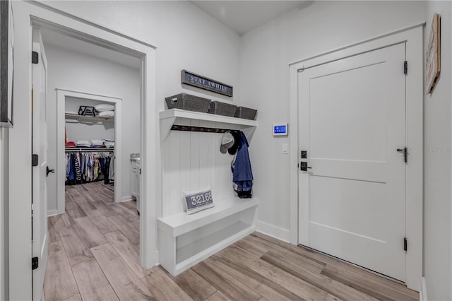 170 Live Oak Ct, New Smyrna Beach, FL 32168 - mudroom featuring light wood finished floors and baseboards
