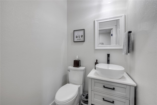 170 Live Oak Ct, New Smyrna Beach, FL 32168 - bathroom featuring vanity and toilet