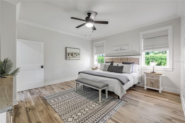 170 Live Oak Ct, New Smyrna Beach, FL 32168 - bedroom with light wood-type flooring, baseboards, ornamental molding, and ceiling fan