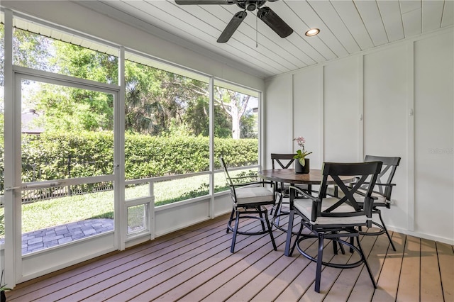 170 Live Oak Ct, New Smyrna Beach, FL 32168 - sunroom / solarium with outdoor dining space and ceiling fan
