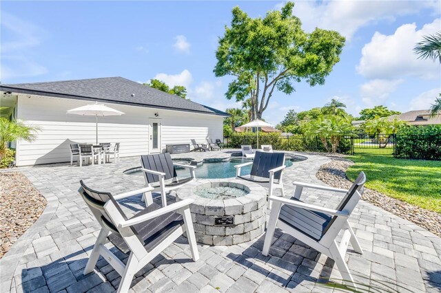 170 Live Oak Ct, New Smyrna Beach, FL 32168 - view of patio / terrace featuring an outdoor fire pit, fence, and a fenced in pool