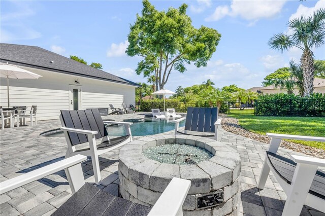170 Live Oak Ct, New Smyrna Beach, FL 32168 - view of patio featuring fence, a fenced in pool, and a fire pit