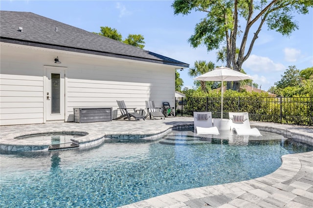 170 Live Oak Ct, New Smyrna Beach, FL 32168 - view of swimming pool with a patio area, a pool with connected hot tub, and fence