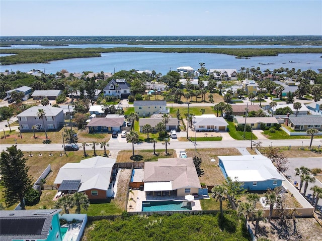 aerial view featuring a residential view and a water view